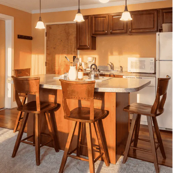 The full kitchen and breakfast bar in a king suite
